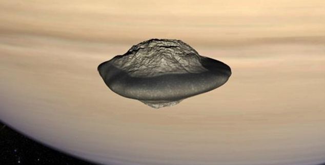 UFO? Pan is Saturn's most inner moon, as seen in this illustration. It orbits within the Encke Gap in the planet's A ring