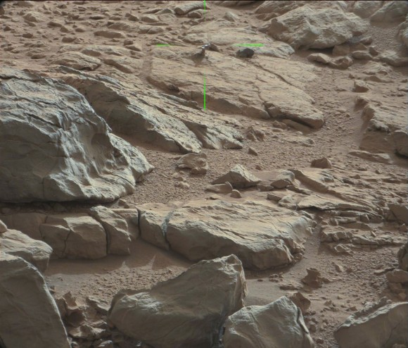 Green lines point to a shiny protuberance on rock imaged by the Curiosity rover on Mars. Credit: NASA/JPL/Malin Space Science Systems. Image processing 2di7 & titanio44 on Flickr. 